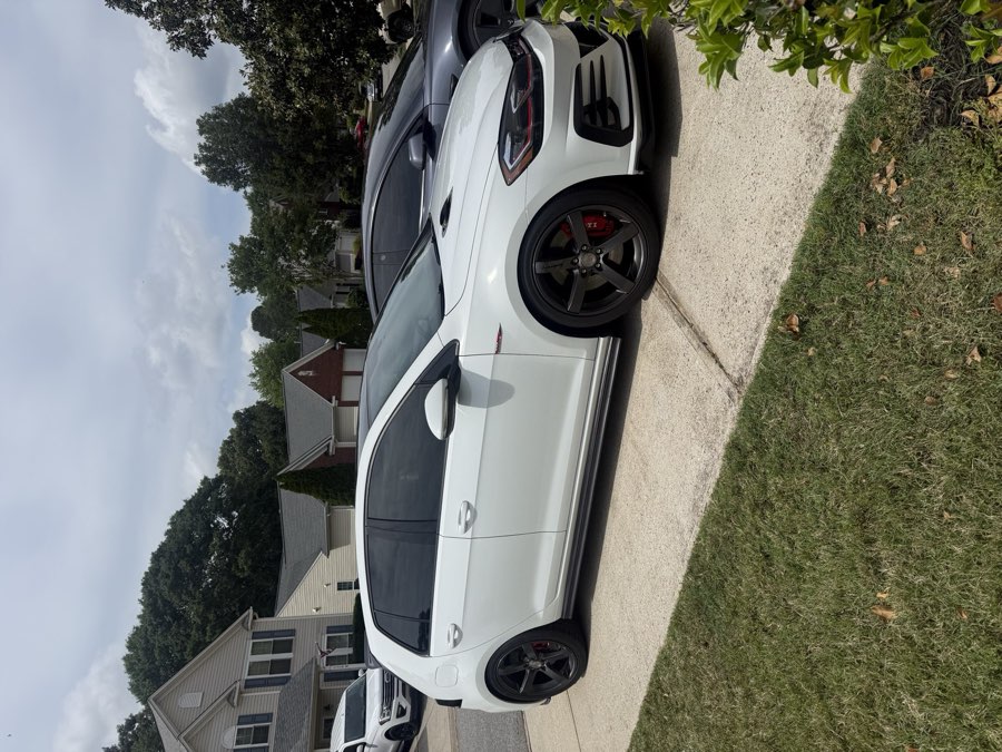 Ceramic window tint installation on a car at Torque N Tint Co. in Five Forks, SC