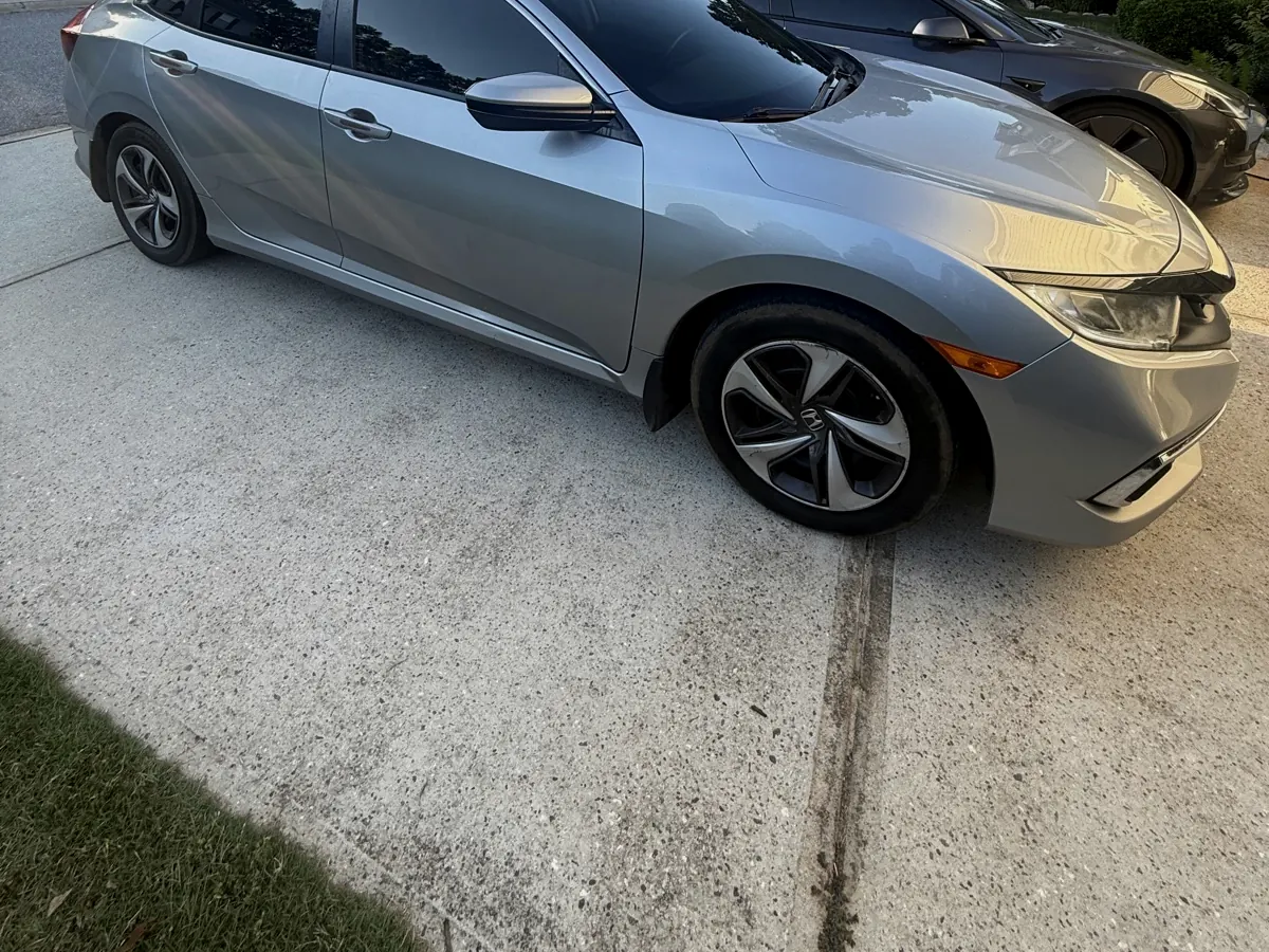 Silver Honda Civic sedan with freshly tinted windows, Five Forks SC