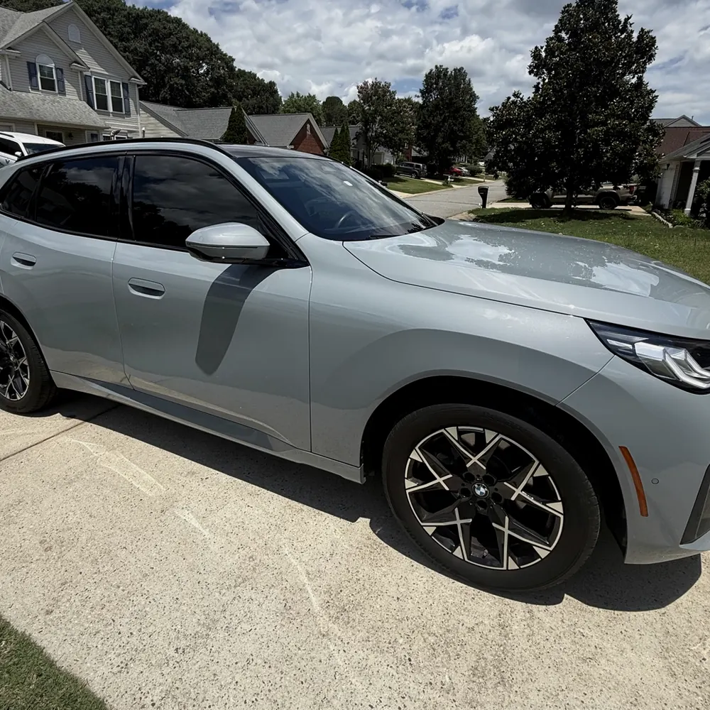 Grey BMW X1 with ceramic window tint, tinted for a Taylors customer