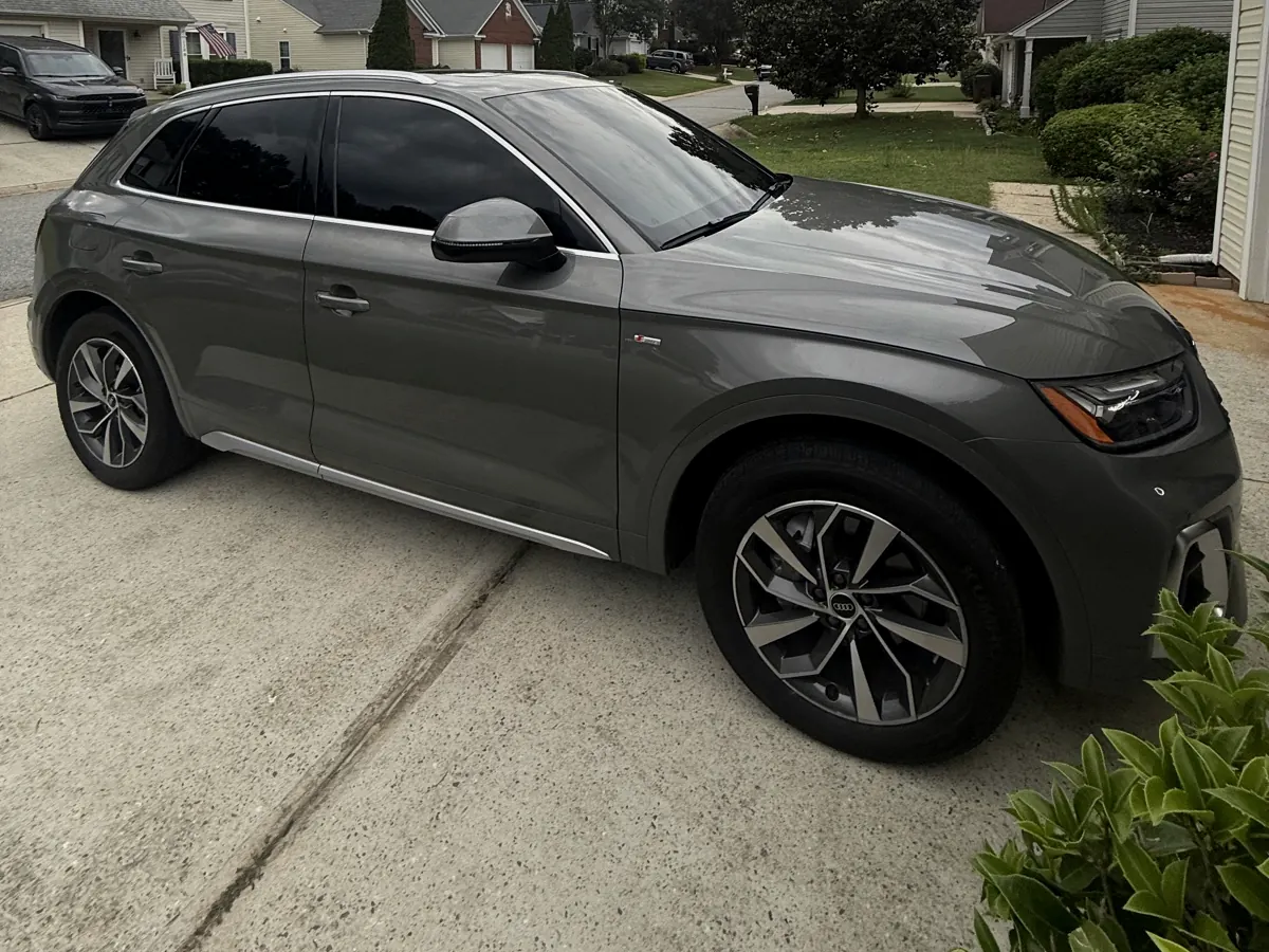 Green Audi Q5 with ceramic tint on rear and side windows